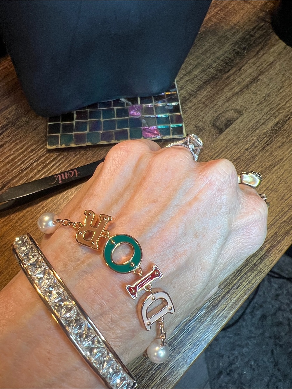 Gold-Tone Letter Charm Bracelet with Green Enamel 'O' Accent